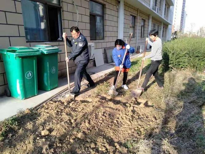 银湾集团怡欣花园种植花卉补栽树木 扮靓绿色家园